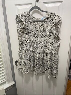 Sleeveless Black & White Dotted Ruffle Peplum Blouse